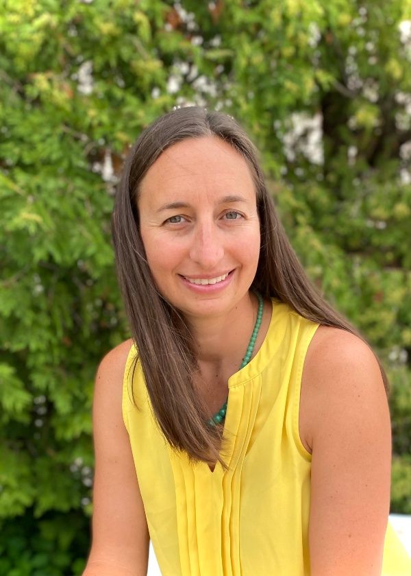 Cassandra Rondel Asencio, LCSW, smiling outdoors